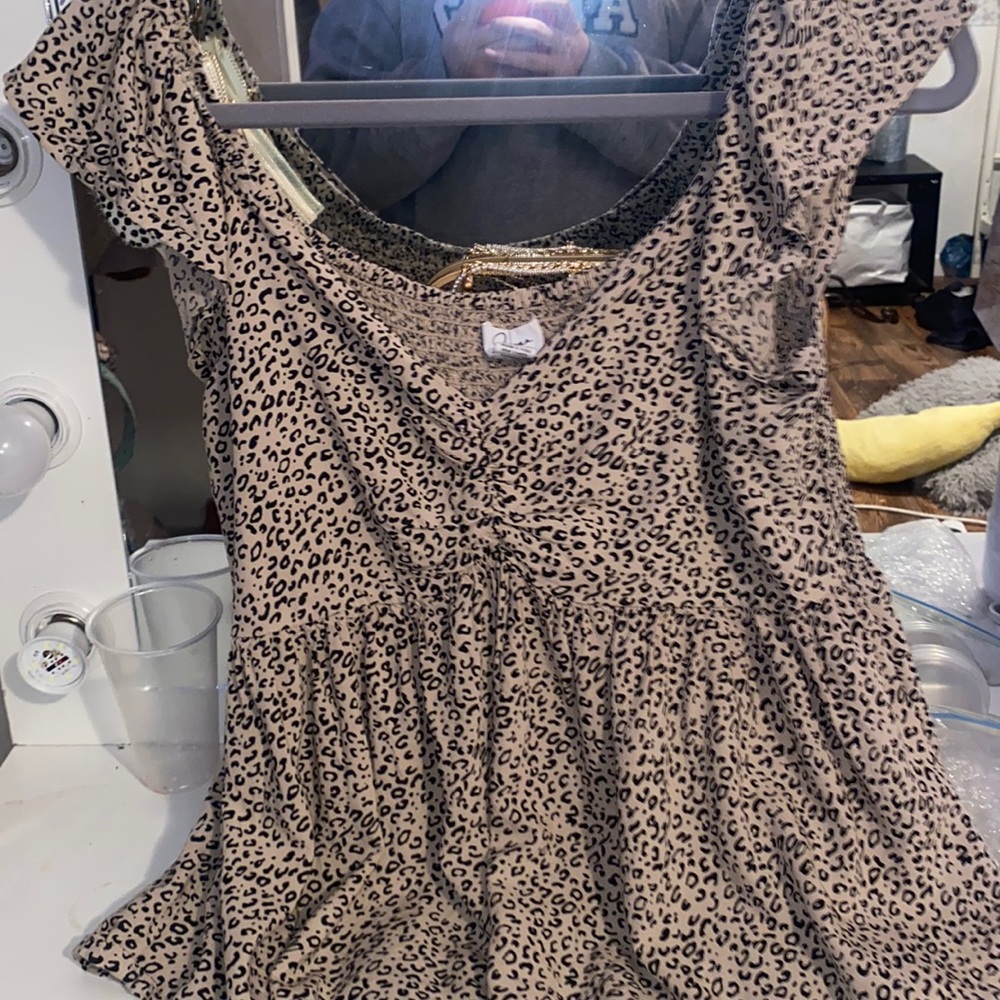 cute cheetah shirt, side medium, wore leather lightly.